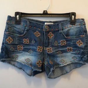 Patchwork cross jean shorts